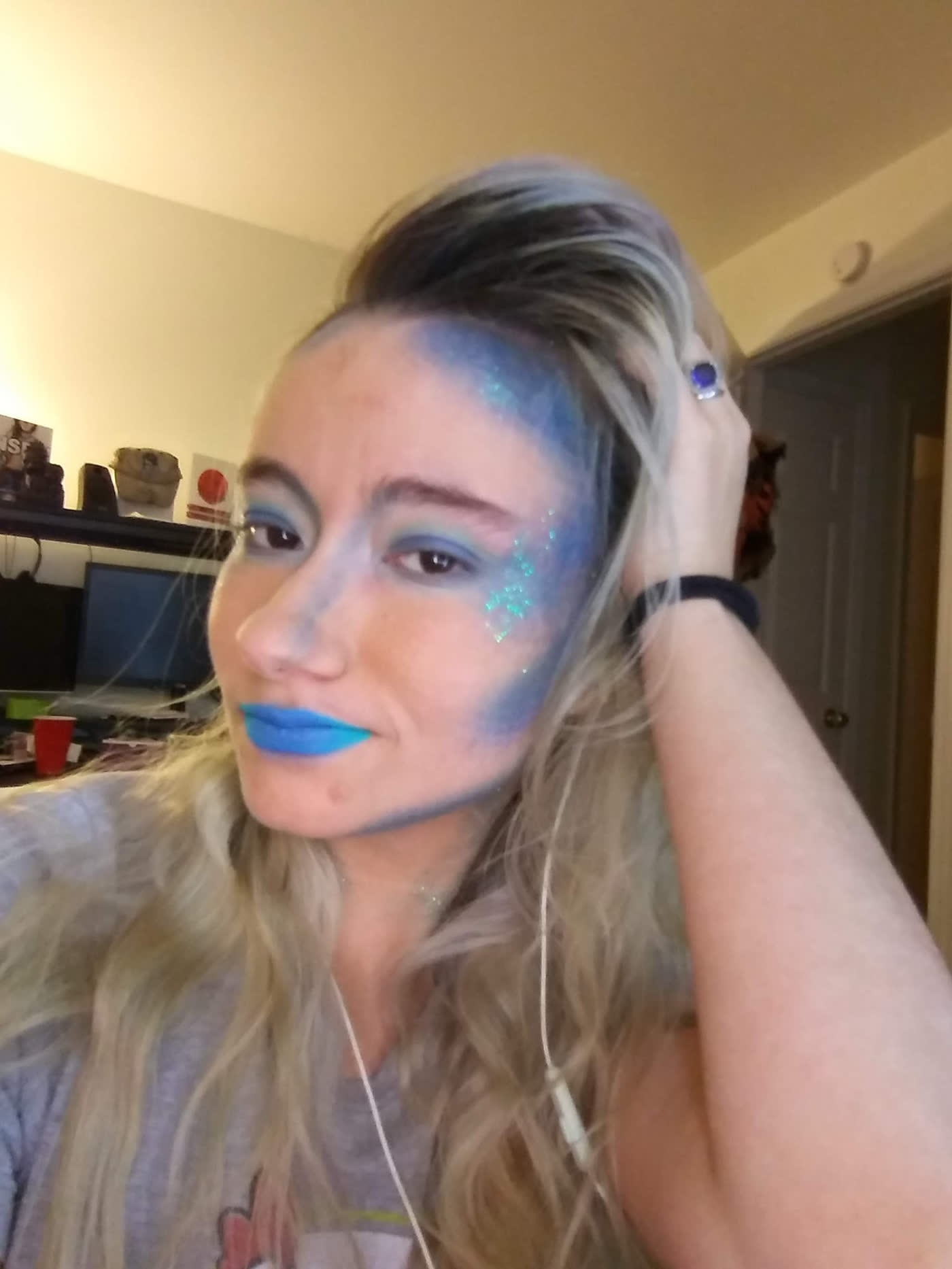 Deep Current — Blue nebula sweeping one whole side, matched to a glossed lip.
