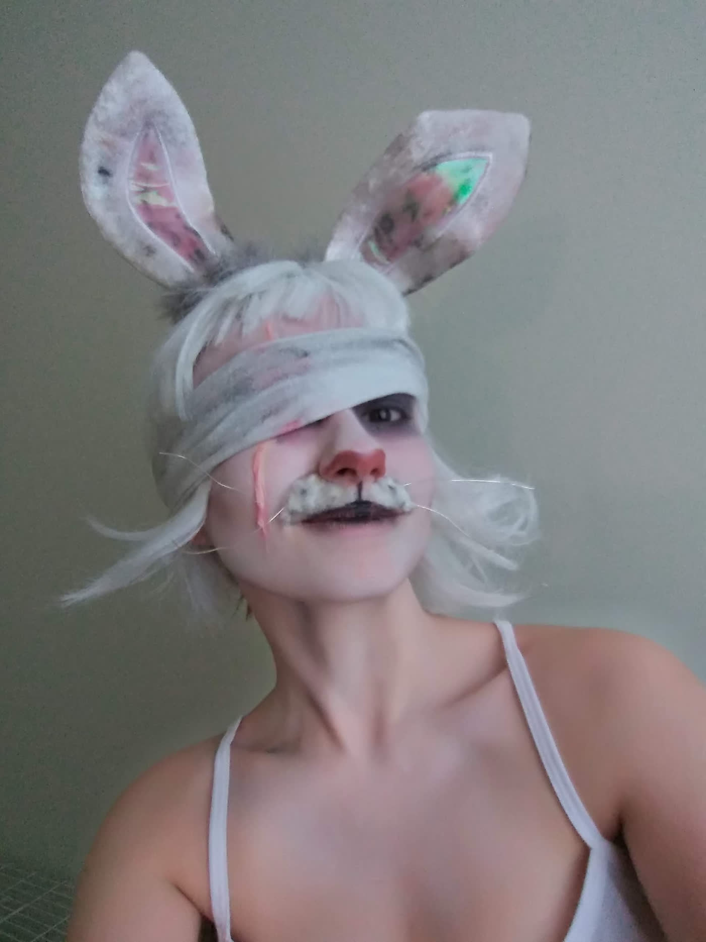 March Hare — Bandaged hare with wire whiskers and a bled-through eye.